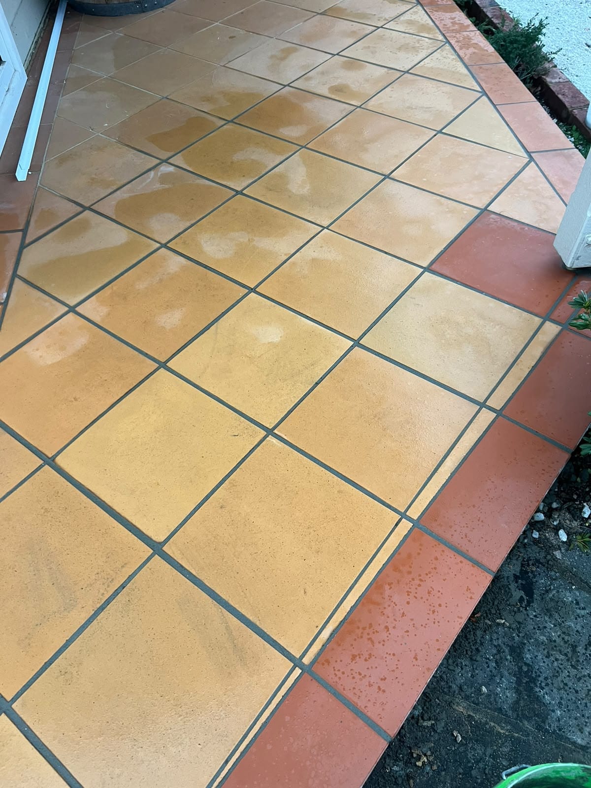 Replaced terracotta corner and border pavers neatly grouted next to pergola post — Melbourne