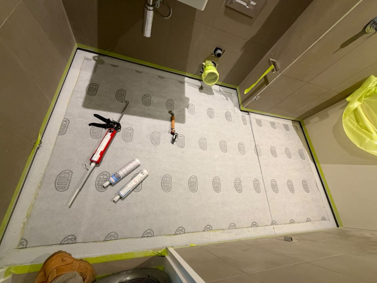 Shower base watertight regrouting and repointing with mould-resistant compound