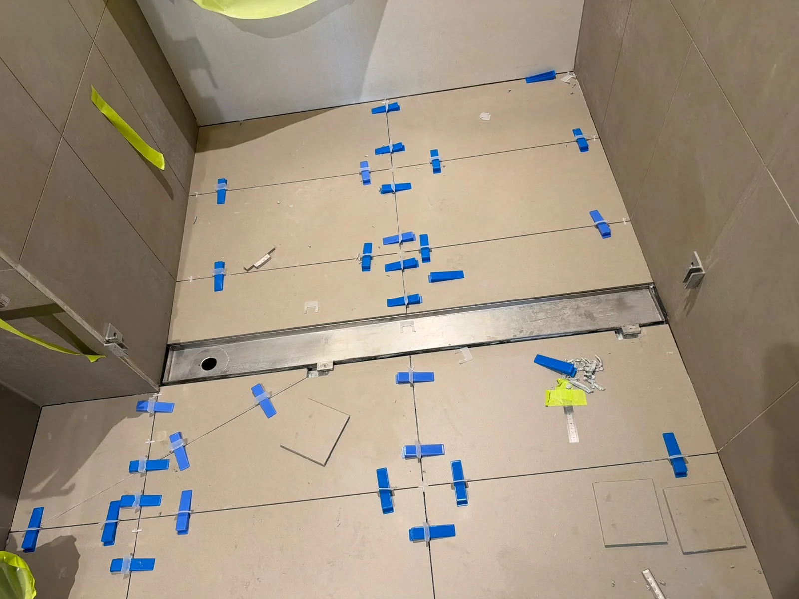 Tile Seal Pro Regrout precision bathroom floor tiling and strip drain levelling