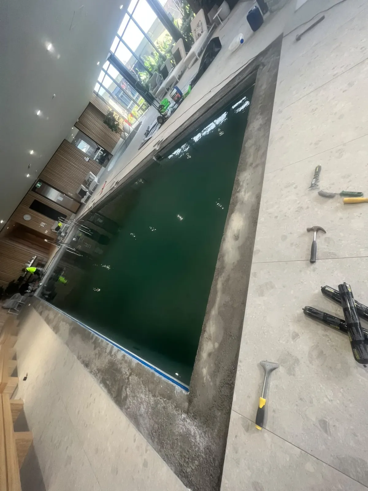 Indoor pool surround coping joint preparation and expansion sealing — Melbourne