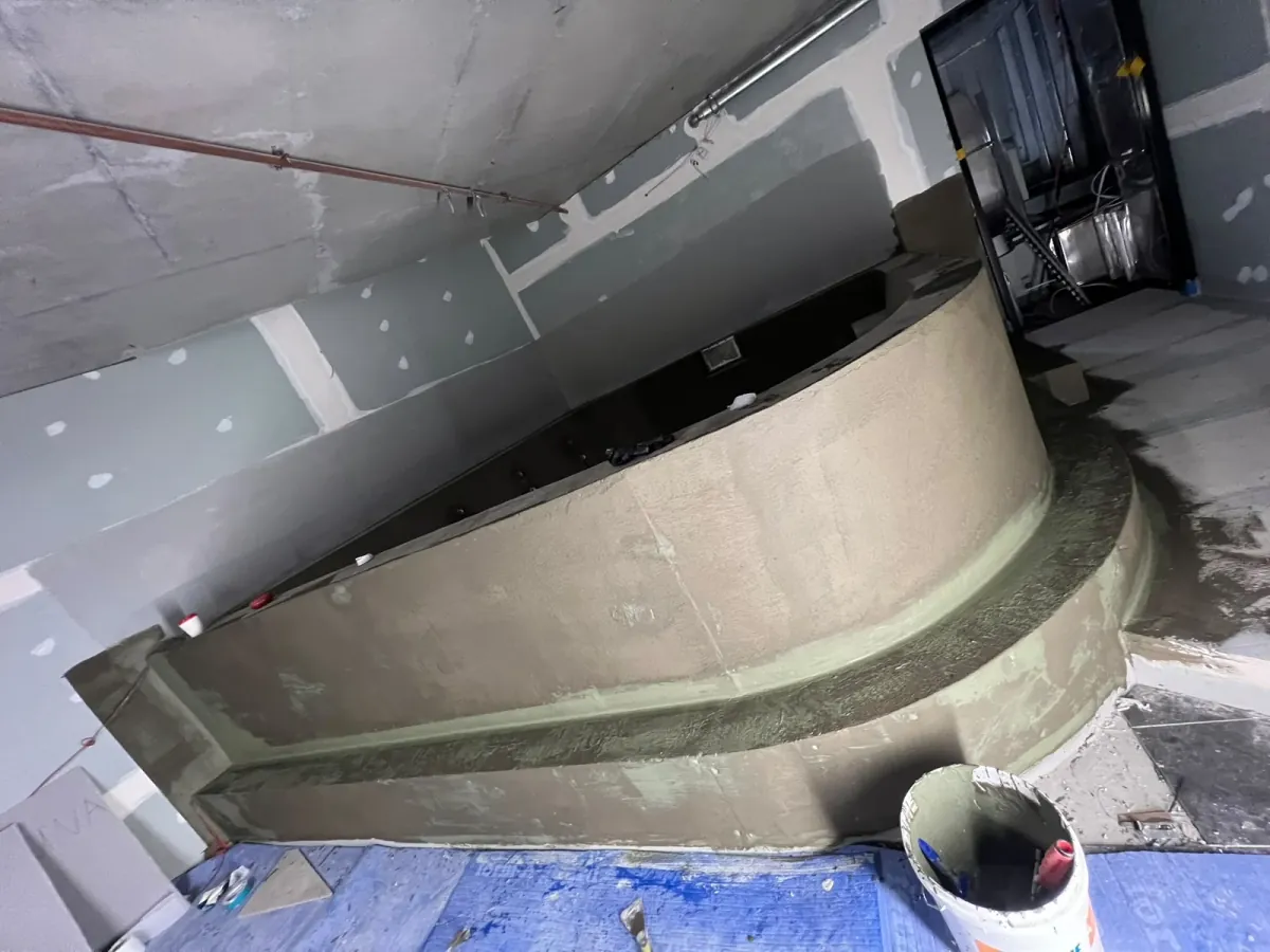 Curved plunge tub hob waterproofed with flexible membrane system — Melbourne