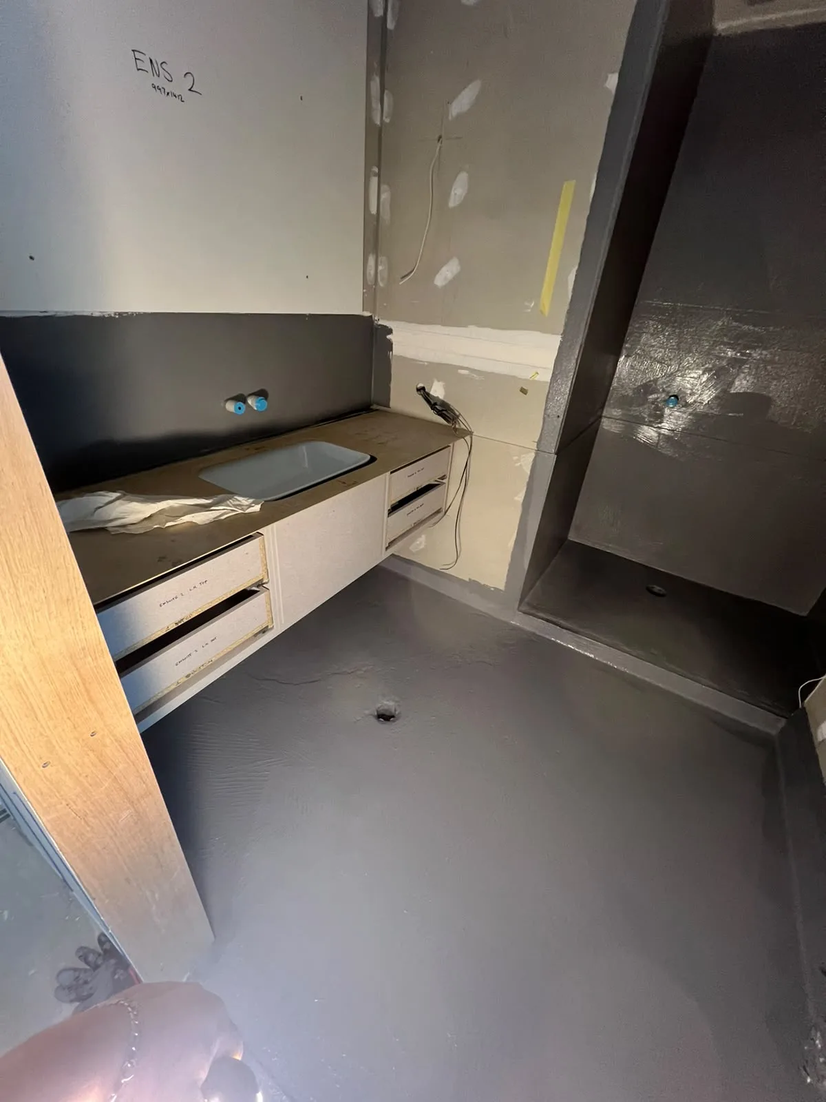 Ensuite floor and shower recess coated with elastomeric waterproofing barrier — Melbourne
